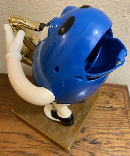 M&M's Blues Guy With Saxaphone Candy Dispenser - The Woodlands Texas  Antiques & Collectibles For Sale - Antiques & Collectibles Classifieds on  Woodlands Online