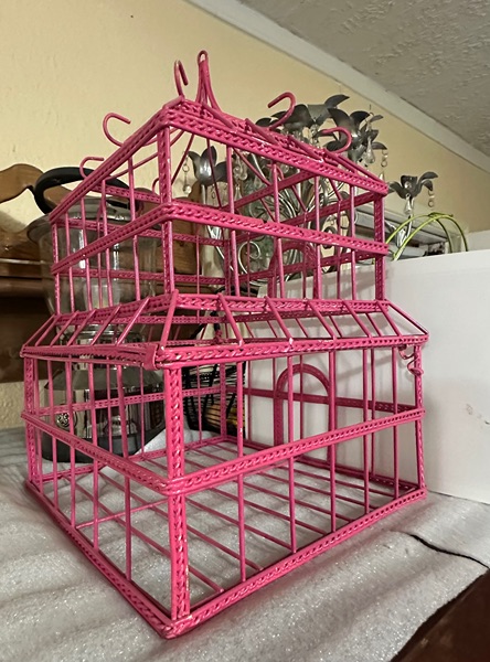 Pink decorative bird cage